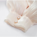 Vestido Curto Todo em Cetim Manga Longa Preto